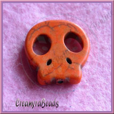 Perla sagoma Teschio in pietra dura howlite Arancio 22x20 mm
